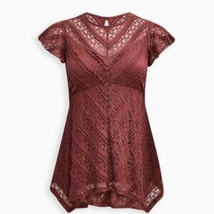 Torrid babydoll lace crew neck sharkbite hem top. New with tags size 4x